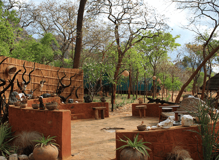 Mozambique Hunting Outdoor safari lodge with traditional decor and wildlife trophies in Mozambique.
